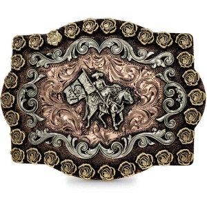 A custom belt buckle for men featuring a mexican charro figure built on a copper hand engraved base, with bronze roses and silver scrolls 